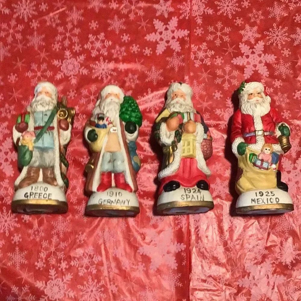Santa figurines set of four dated your Greece Spain Germany in Mexico